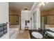Bathroom with a jacuzzi tub, a separate shower, and tiled floors at 1786 Dekalb Ne Ave, Atlanta, GA 30307