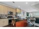 Spacious kitchen with stainless steel appliances, light cabinets, and dark hardwood floors at 1786 Dekalb Ne Ave, Atlanta, GA 30307