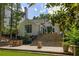 Expansive backyard boasts a stone patio and grand staircase leading to the house at 21 Barksdale Ne Dr, Atlanta, GA 30309