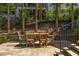 Stone patio features an outdoor dining table for alfresco meals at 21 Barksdale Ne Dr, Atlanta, GA 30309