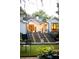 Lush backyard with outdoor seating, illuminated steps, and a fountain at 21 Barksdale Ne Dr, Atlanta, GA 30309