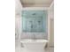 Modern bathroom with a freestanding tub and frameless glass shower enclosure at 21 Barksdale Ne Dr, Atlanta, GA 30309