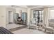 Open-concept bedroom with office nook and sitting area near large windows at 21 Barksdale Ne Dr, Atlanta, GA 30309