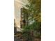 Exterior view showcasing a large arched window and a wrought iron railing at 21 Barksdale Ne Dr, Atlanta, GA 30309