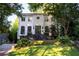 Stunning two-story home with manicured lawn and elegant black brick stairway at 21 Barksdale Ne Dr, Atlanta, GA 30309
