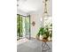 Grand foyer with modern lighting fixture, and views to the outdoors at 21 Barksdale Ne Dr, Atlanta, GA 30309