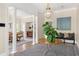 Welcoming foyer with decorative columns, stylish lighting, and a cozy seating area at 21 Barksdale Ne Dr, Atlanta, GA 30309