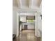 Open view of a well-lit kitchen with white cabinets and stainless steel appliances from the doorway at 21 Barksdale Ne Dr, Atlanta, GA 30309