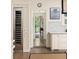 Modern kitchen showcasing custom cabinetry, wine cooler, marble backsplash, and hardwood floors at 21 Barksdale Ne Dr, Atlanta, GA 30309