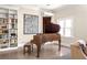 Elegant living room featuring a grand piano, built-in bookshelves, and neutral decor at 21 Barksdale Ne Dr, Atlanta, GA 30309