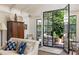 Inviting living room with patio access through large glass doors, and comfortable seating at 21 Barksdale Ne Dr, Atlanta, GA 30309