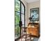 Charming office nook with vintage wooden desk and elegant decor, bathed in natural light at 21 Barksdale Ne Dr, Atlanta, GA 30309