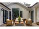 Charming patio with outdoor furniture, stone pavers, and views of the lush backyard at 21 Barksdale Ne Dr, Atlanta, GA 30309