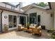 Exterior of patio featuring outdoor furniture and views of the lush backyard at 21 Barksdale Ne Dr, Atlanta, GA 30309