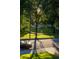Street view of a park with mature trees and a black car parked nearby at 21 Barksdale Ne Dr, Atlanta, GA 30309