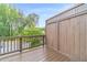 Private balcony with wooden floors and walls, offering a cozy outdoor space at 2252 Talmai Dr, Snellville, GA 30078