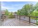 Apartment deck overlooking parking lot and trees at 2252 Talmai Dr, Snellville, GA 30078