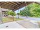 Spacious two-car garage with a view of the landscaped community and parking area at 2252 Talmai Dr, Snellville, GA 30078