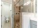 Contemporary bathroom showcasing a glass shower with tile surround at 2252 Talmai Dr, Snellville, GA 30078