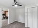 Bright bedroom with large closet and ceiling fan at 389 Oglesby Bridge Se Rd, Conyers, GA 30094