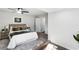 Bright, stylish bedroom features a plush bed, modern decor, and ample natural light at 389 Oglesby Bridge Se Rd, Conyers, GA 30094