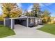 Charming home with a convenient carport and well-manicured lawn at 389 Oglesby Bridge Se Rd, Conyers, GA 30094