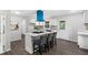 Stylish kitchen with island seating and ample counter space at 389 Oglesby Bridge Se Rd, Conyers, GA 30094