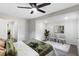 Bright and airy bedroom with modern decor, plush bedding and natural light at 389 Oglesby Bridge Se Rd, Conyers, GA 30094