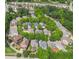 An aerial view of a neighborhood with mature trees and well-maintained homes at 612 Concord Lake Se Cir, Smyrna, GA 30082