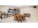Spacious bonus room with plenty of storage, and an antique dining table with chairs on wheels at 612 Concord Lake Se Cir, Smyrna, GA 30082