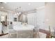 Kitchen and dining space shows modern table and chairs and storage along the wall at 612 Concord Lake Se Cir, Smyrna, GA 30082