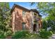Stunning two-story brick and stone home with a charming balcony and lush landscaping at 612 Concord Lake Se Cir, Smyrna, GA 30082