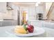 Bright and modern kitchen design with stainless appliances and a view to the living area at 612 Concord Lake Se Cir, Smyrna, GA 30082