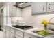 Gourmet kitchen with stainless steel appliances, a gas cooktop, and subway tile backsplash at 612 Concord Lake Se Cir, Smyrna, GA 30082