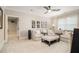 Cozy living room with a comfortable seating area, entertainment center, and carpet flooring at 612 Concord Lake Se Cir, Smyrna, GA 30082