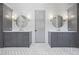 Spacious bathroom featuring double vanities with marble countertops and shiplap accents at 115 Trinity Hollow Dr, Canton, GA 30115