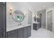 Elegant bathroom with marble countertops, white shiplap walls, and herringbone-patterned floors at 115 Trinity Hollow Dr, Canton, GA 30115