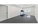 Exercise room with hardwood floors and a treadmill at 115 Trinity Hollow Dr, Canton, GA 30115