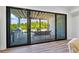 Beautiful outdoor living space featuring an outdoor kitchen, seating area, and views of the pool at 115 Trinity Hollow Dr, Canton, GA 30115