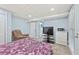 Bedroom featuring a king-sized bed and access to the backyard through double doors at 4733 Julian Way, Acworth, GA 30101