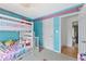 Bright bedroom with bunk beds, colorful decor, and carpet flooring at 4733 Julian Way, Acworth, GA 30101