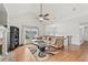 Bright living room with a stone fireplace, soaring ceilings, and hardwood floors, offering a cozy and stylish space at 4733 Julian Way, Acworth, GA 30101