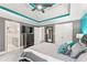 Spacious main bedroom featuring a tray ceiling, a walk-in closet, and ensuite bath at 4733 Julian Way, Acworth, GA 30101