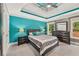 Spacious main bedroom featuring a tray ceiling, and large windows at 4733 Julian Way, Acworth, GA 30101