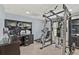 Workout and office space featuring full home gym, cabinets, and desk at 4733 Julian Way, Acworth, GA 30101