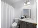 Bathroom featuring a tub-shower combination, and a single-sink vanity with storage at 5258 Tallgrass Nw Way, Kennesaw, GA 30152