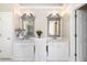 Elegant bathroom featuring double sinks, decorative mirrors, and ample counter space at 5258 Tallgrass Nw Way, Kennesaw, GA 30152