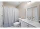 Well-lit bathroom featuring a shower-tub combination and a contemporary vanity at 5258 Tallgrass Nw Way, Kennesaw, GA 30152