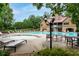 Luxurious community pool area with ample lounge seating, perfect for relaxation and recreation at 5258 Tallgrass Nw Way, Kennesaw, GA 30152