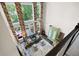 Spacious living room with large windows, a ceiling fan, and stylish decor at 5258 Tallgrass Nw Way, Kennesaw, GA 30152